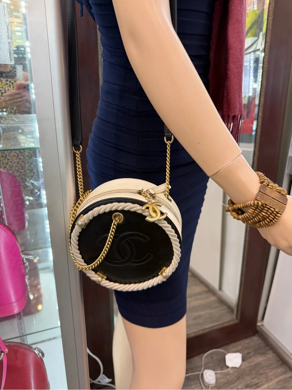 CHANEL Black Round Leather Crossbody with Cream Rope and Gold Hardware